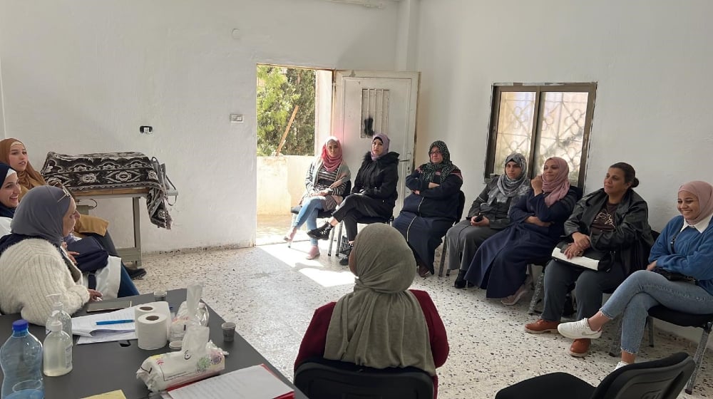 A  meeting is held at the newly established women-run centre in Issawiyah, Jerusalem. Image courtesy of PCC.