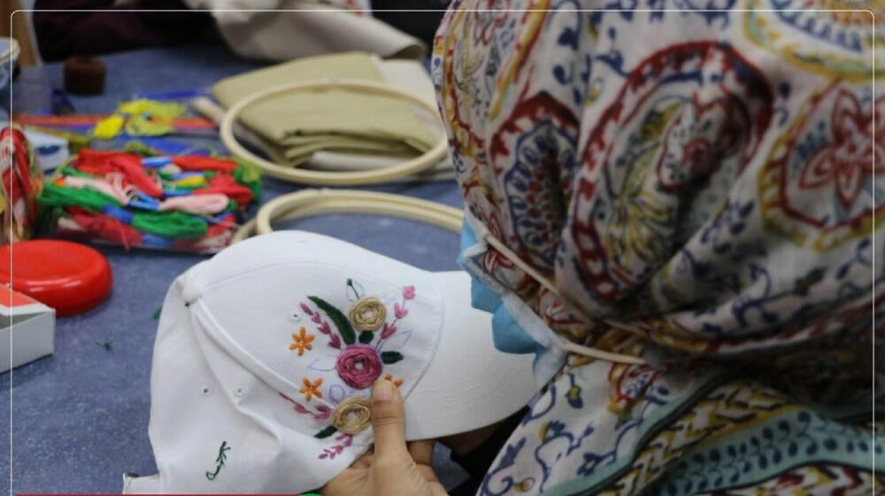 Embroidery by a woman survivor of violence at ACHA safe space